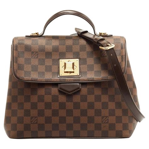 louis vuitton twist lock bag|louis vuitton lock it bag.